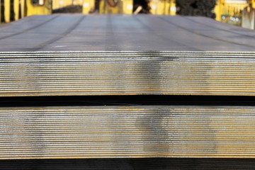 Steel plate. Metal sheet. Hot-rolled flat steel. Metal leaf. Rusty ferrum. Heavy steel plates.