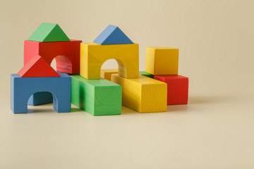 Obraz premium Wooden cubes on beige background