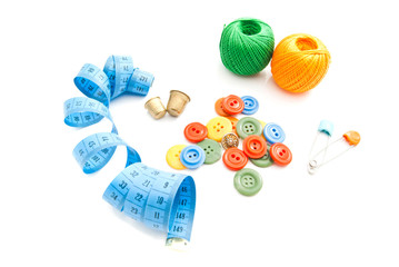 meter, buttons, thread and thimbles