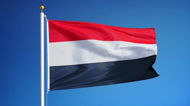 Yemen flag waving in slow motion against clean blue sky, seamlessly looped, close up, isolated on alpha channel with black and white luminance matte, perfect for film, news, digital composition