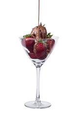 pouring chocolate in strawberries on the wine glass