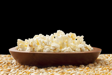 plate of popcorn and corn grains