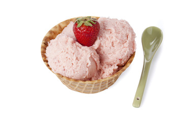 strawberry ice cream in sugar cone with spoon