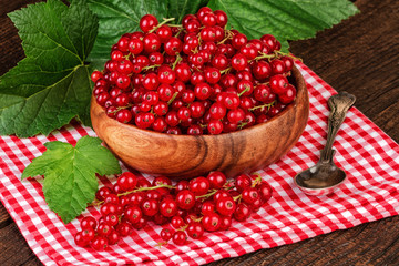 Redcurrant on a rustic background