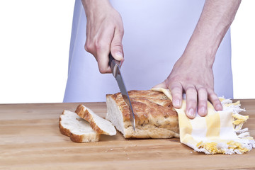 baker slicing bread