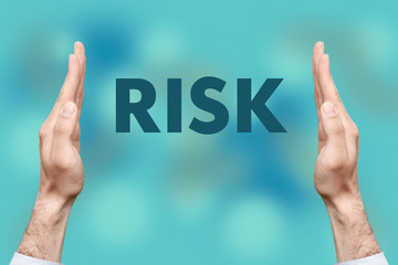 Businessmen from both hands " RISK " writes