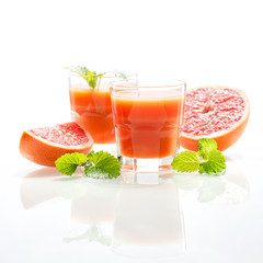 Grapefruit juice with fruits and mint leaves