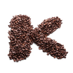 letter k, alphabet from coffee beans isolated on white background