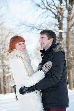 Happy couple in winter park