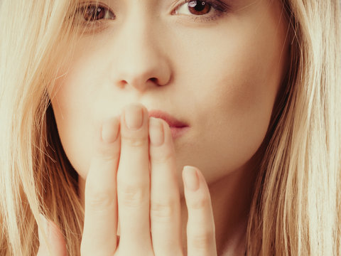 Surprised Woman Face Covering Her Mouth With Hand