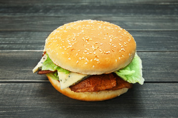 Meet and cheese burger at rustic wood