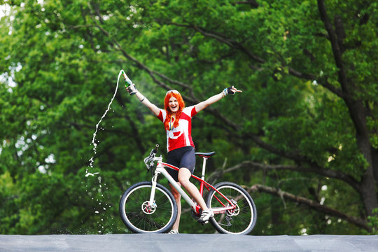 Young Woman Wins The Race Crossing Finish Line