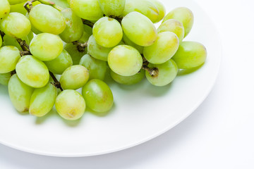 Grapes on a White Plate