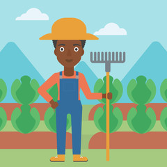 Farmer with rake.