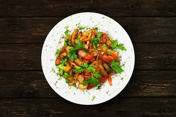 Roasted potatoes with vegetables and mushrooms