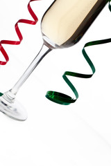 cropped image of a champagne flute with streamers.
