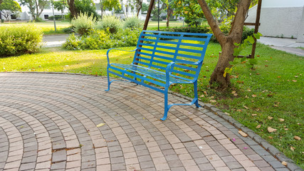 Steel bench in the park 