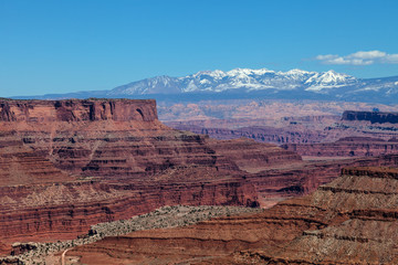 Utah-Canyonlands National Park-Island in the Sky District. This area of Island in the Sky affords one spectacular views of the Manti la Sal Mountains and the White Rim Road below