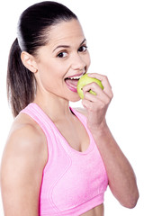 Healthy diet, nutritious diet. Woman eating green apple.