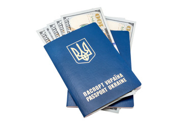Ukrainian passports with dollars isolated on white