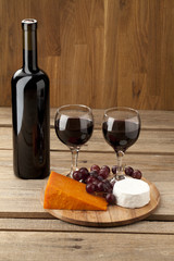 red wine with cheese and grapes