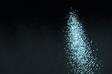 abstract bokeh light on dark background