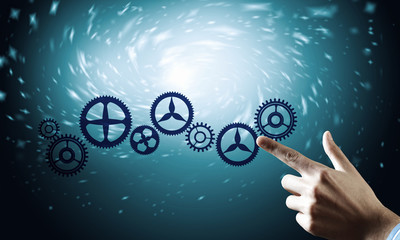 Cogwheel mechanism as teamwork concept
