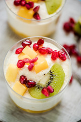 Tropical dessert with kiwi and pomegranate