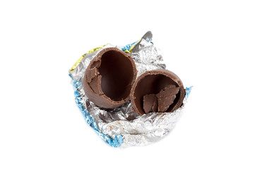 close-up image of broken easter egg chocolate.