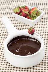 strawberry dipped in chocolate syrup