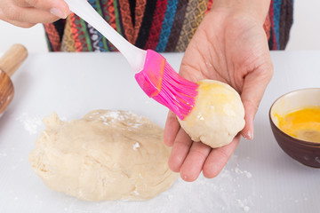Female hands baking dough