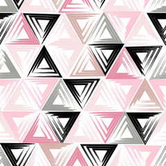 Cute vector geometric seamless pattern. Brush strokes, triangles. Hand drawn grunge texture. Abstract forms. Endless texture can be used for printing onto fabric or paper