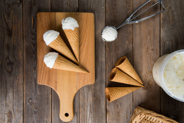 creamy vanilla ice cream in preparation with rustic background a