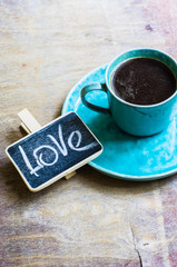 Cup of coffee and Love word