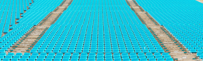 Naklejka premium Pattern empty turquoise blue plastic grandstand seats with number