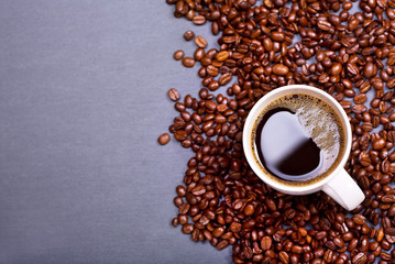 cup of coffee with beans