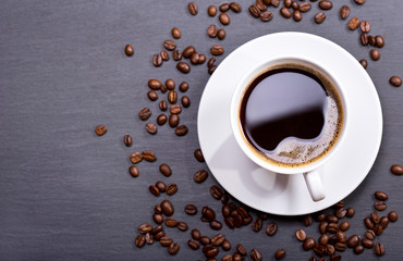 cup of coffee with beans
