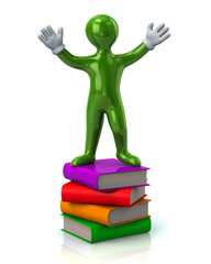 Green man standing on a stack of books