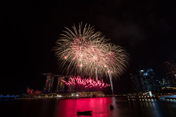 Fireworks over Marina Bay during Singapore national day parade combined Rehearsal in Marina bay, Singapore