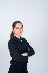 Business woman standing sideways simply in black shirt