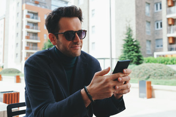 Young businessman using a smartphone