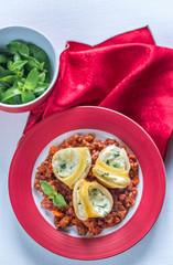 Lumaconi stuffed with ricotta with bolognese sauce