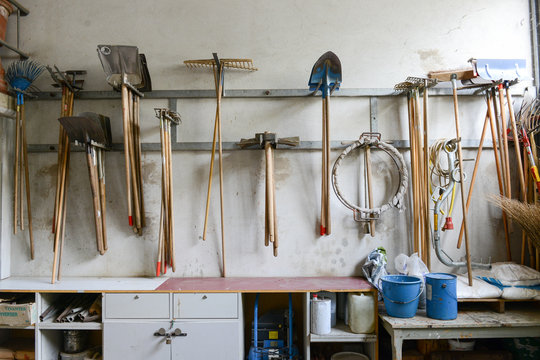 Gardening tools on a wall