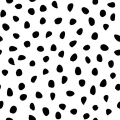 Seamless vector background with random shapes. Tileable ornament. Dotted abstract background with repeating elements. Black and white pattern