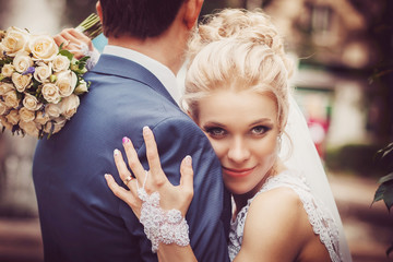 wedding couple. Portrait Of Happy Married Young Couple Outdoor. wedding day.  toned ,