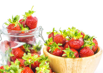 fresh whole strawberries in wooden bowl