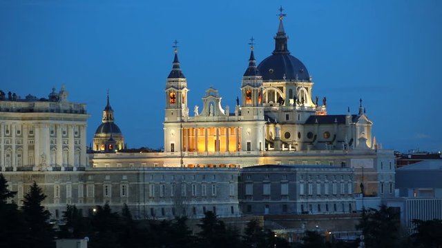 Panning shot of  Santa Maria la Real de La Almudena Cathedral and the Royal Palace. Madrid, Spain