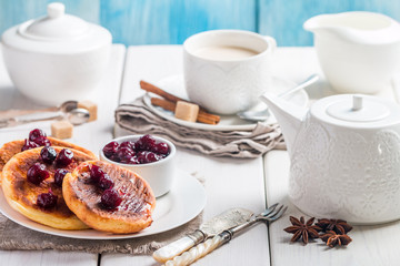 Cottage cheese pancakes with cherry sauce