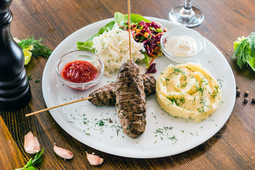 kebab with mashed potatoes