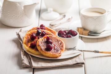 Cottage cheese pancakes with cherry sauce